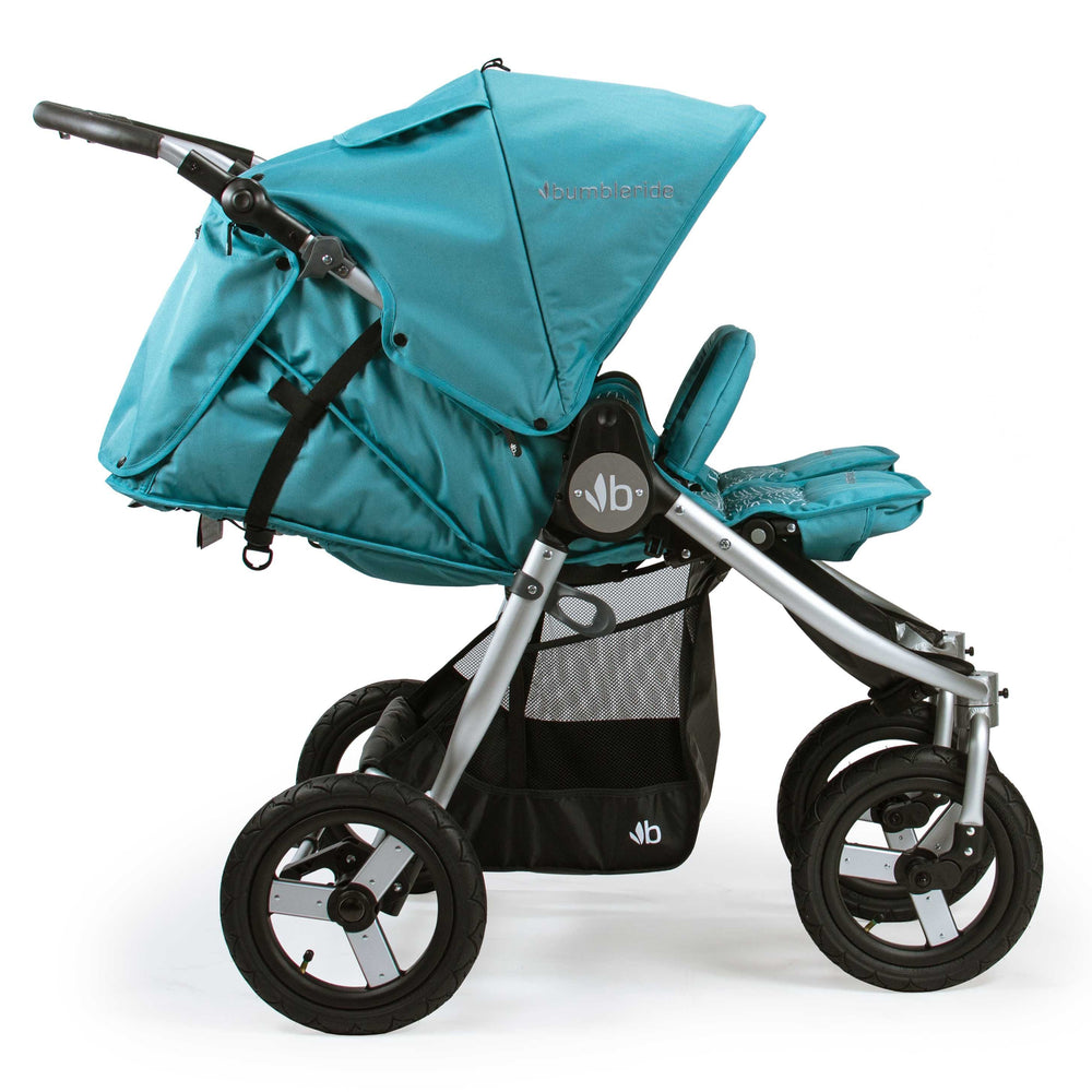 
                      
                        Bumbleride Indie Twin Double Stroller Tourmaline Wave Profile View
                      
                    
