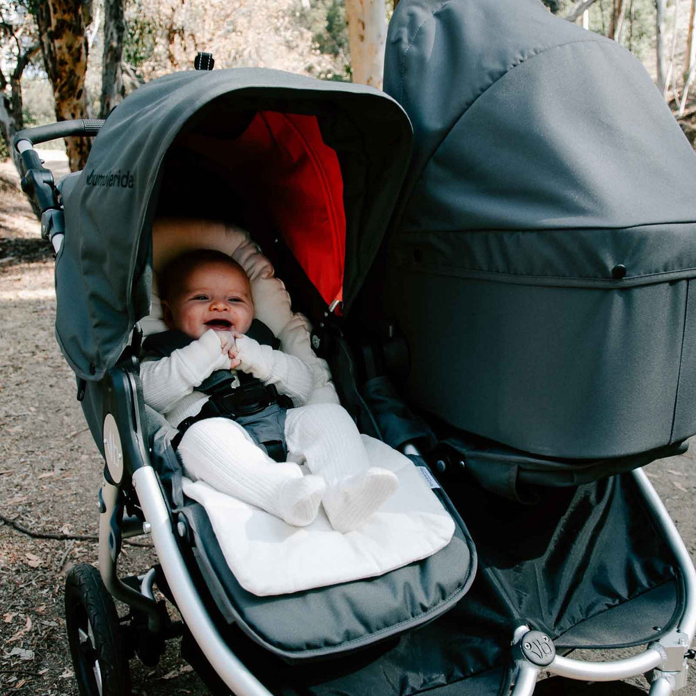 
                      
                        Organic Cotton Infant Insert on Bumbleride Indie Twin Double Stroller in Dawn Grey Coral
                      
                    